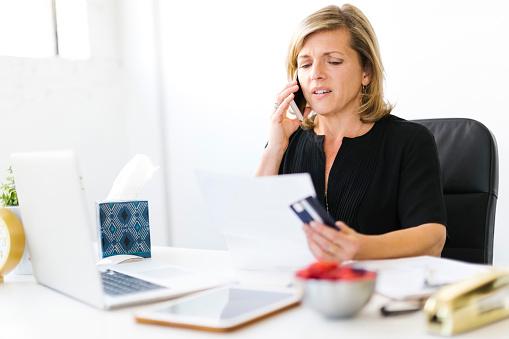 woman reviewing credit report